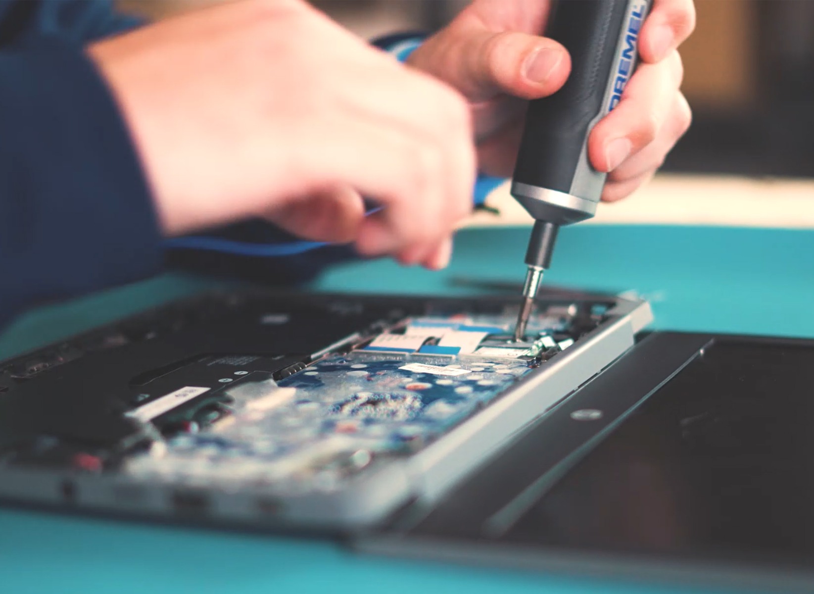 Image of screwdriver fixing computer